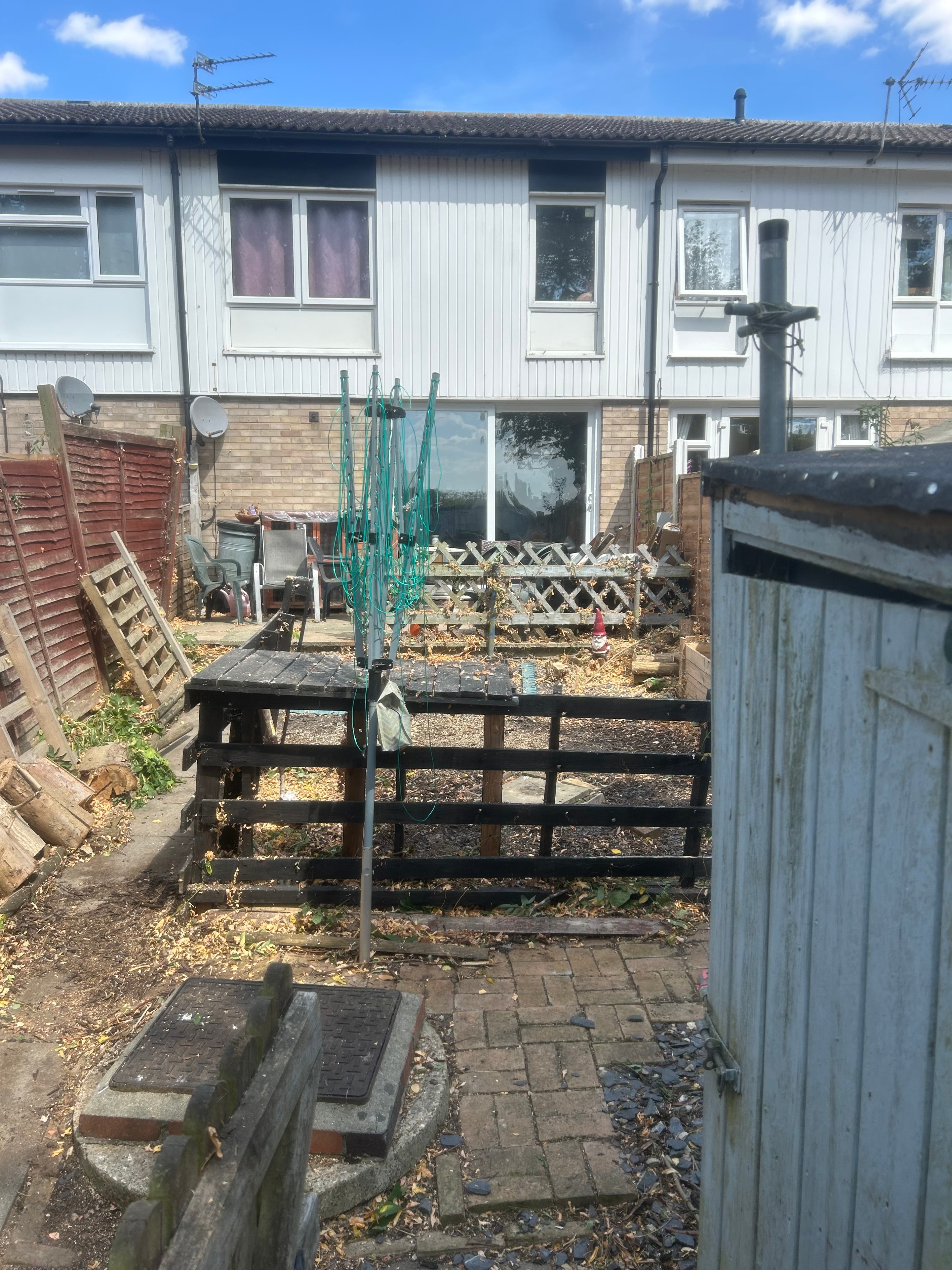 Back garden fully cleared after tree removal by S&S Tree Services